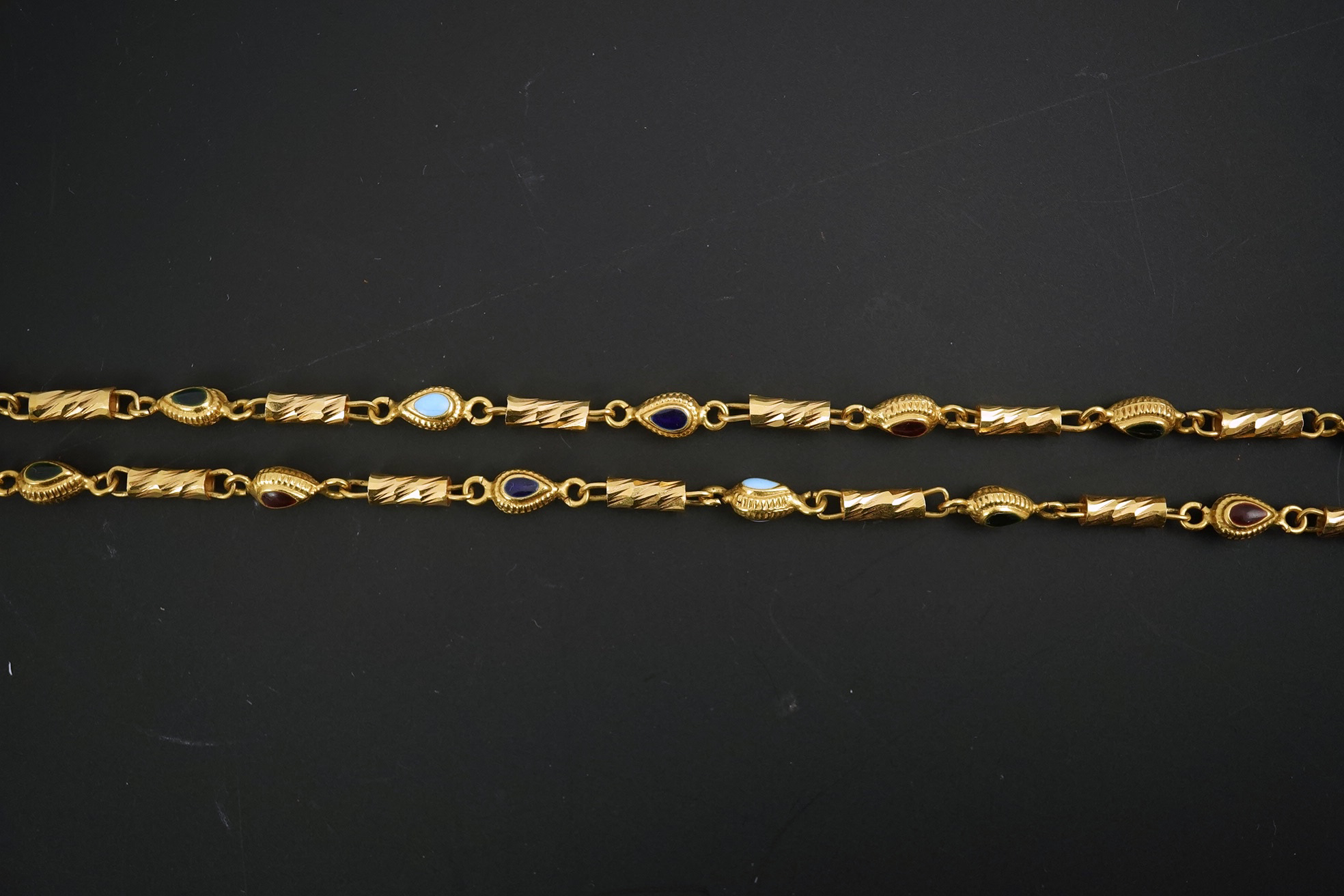 A modern Middle Eastern gold and polychrome enamel set necklace